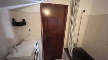 Hair dryer, bidet, towels, toilet paper