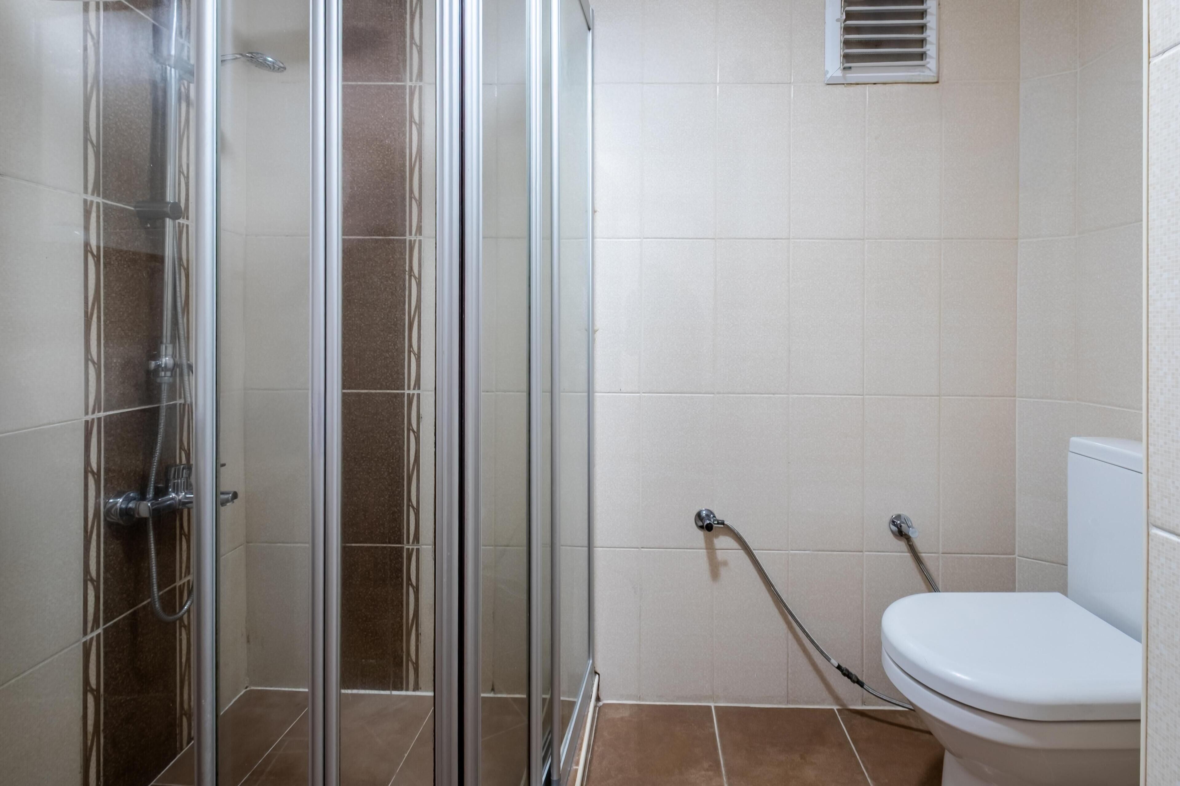 Camera Deluxe, vista città | Bagno | Doccia, asciugacapelli, asciugamani, sapone