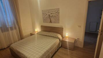2 dormitorios, tabla de planchar con plancha, wifi y ropa de cama