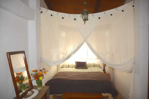 Arco Iris Farm surrounded by mountains and nature in the Sacred Valley Vilcabamba