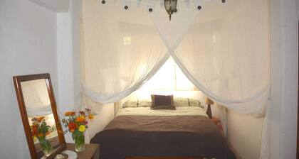 Arco Iris Farm surrounded by mountains and nature in the Sacred Valley Vilcabamba