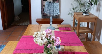 Arco Iris Farm surrounded by mountains and nature in the Sacred Valley Vilcabamba