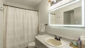 Hair dryer, towels, soap, shampoo