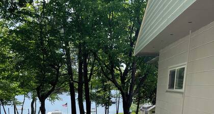 Superb Lake Front 2-bedroom cabin in Cheboygan perfect for relaxing getaways.