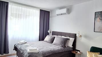 1 dormitorio, tabla de planchar con plancha, cuna de viaje y wifi gratis