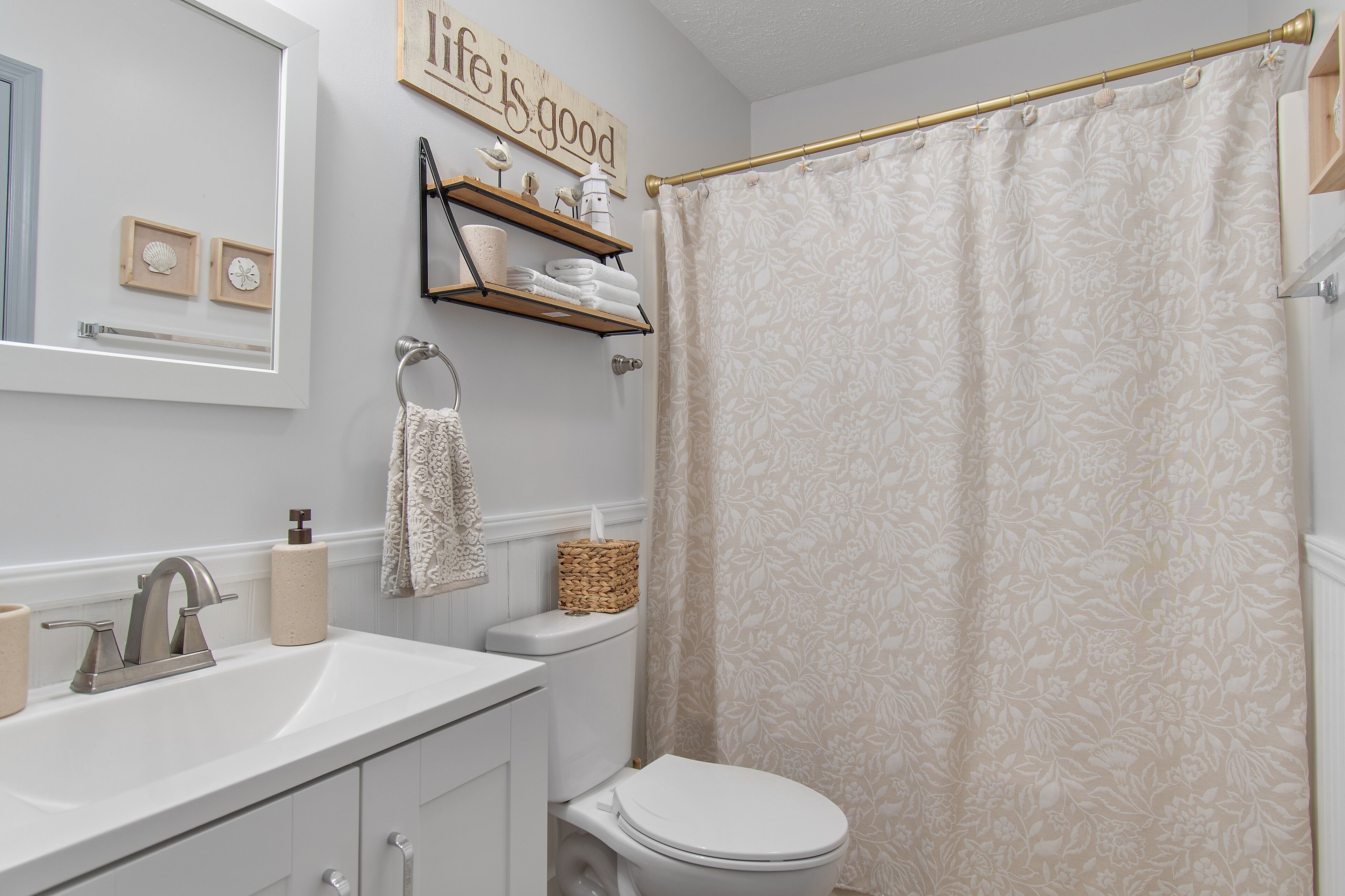 Shower, towels, soap, toilet paper
