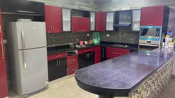 Villa, Balcony, Garden View | Private kitchen
