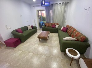 Vila, sacada, vista para o jardim | Área de estar