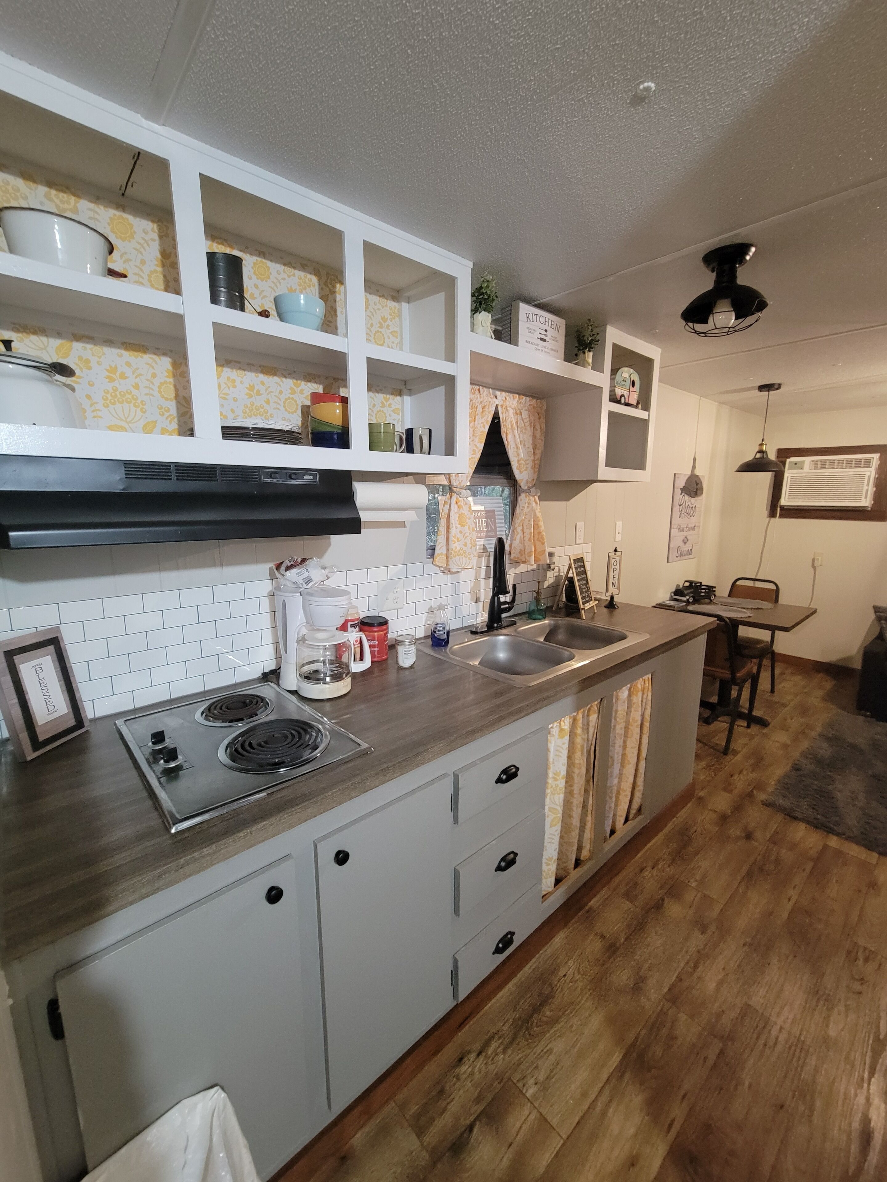 Fridge, microwave, stovetop, coffee/tea maker