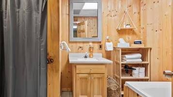 Jetted tub, hair dryer, towels, soap