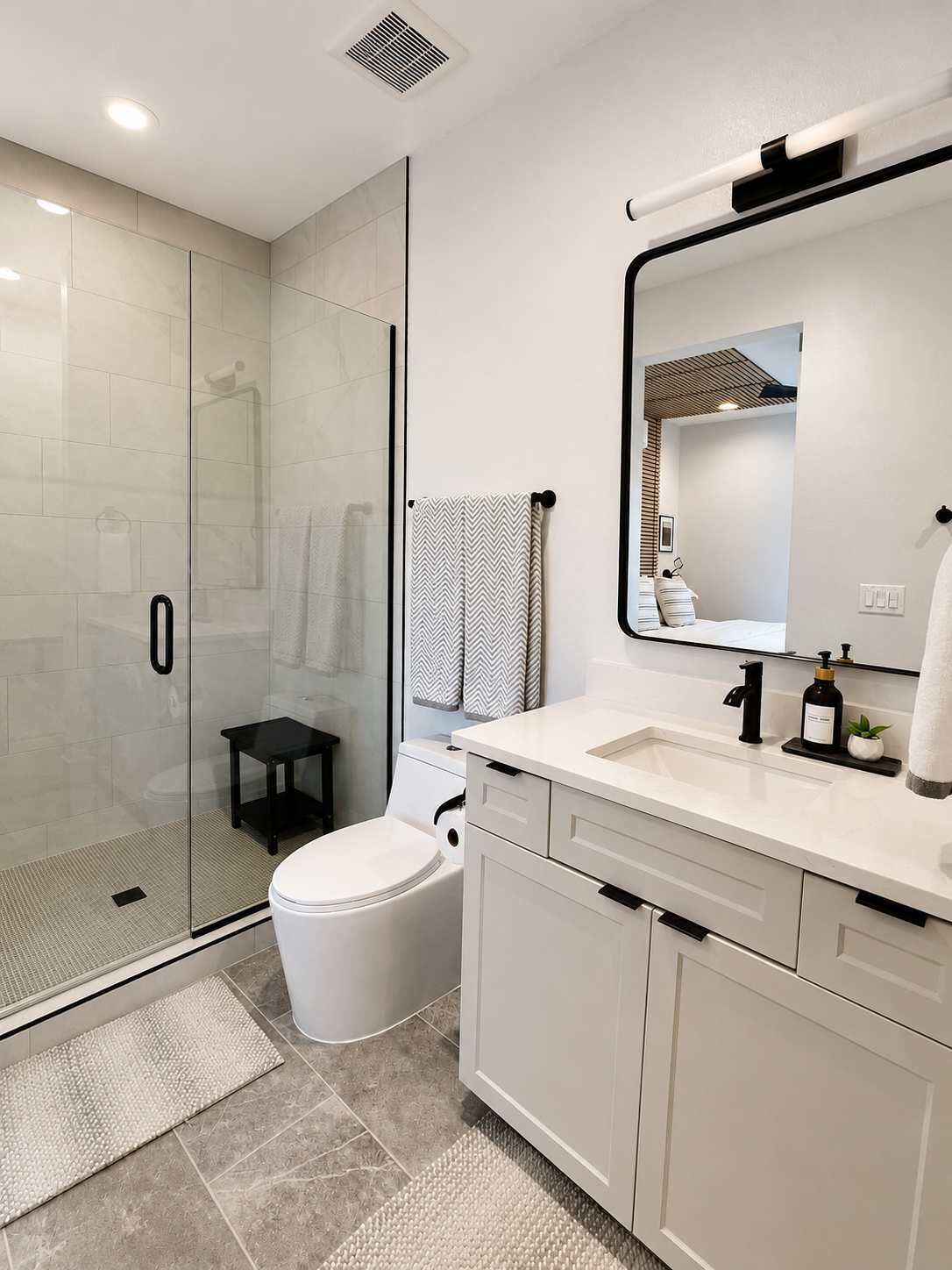 Shower, hair dryer, towels, shampoo