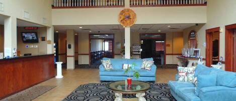 Gather comfortably in the airy lobby with plenty of seating.