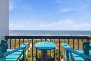 A balcony with a view of the beach and ocean. - Oceanfront Corner Unit-3BR Retreat at Waterpointe I (North Myrtle Beach)