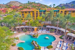A resort with a large pool, multiple lounge areas, and a mountainous backdrop. - 2 Comfortable Resort Rooms in Mountain Resort w/ Seven Pools & Water Slide (Phoenix)