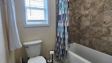 Jetted tub, hair dryer, bidet, towels