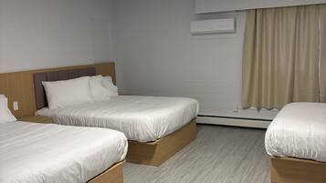 Suite, Multiple Beds, Non Smoking | Free WiFi, bed sheets