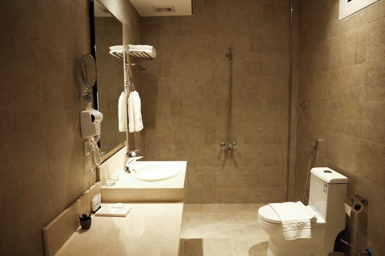 Combined shower/tub, hair dryer, towels, soap