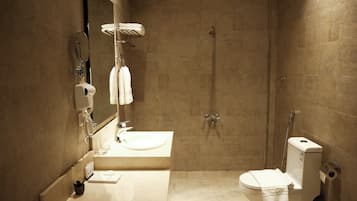 Combined shower/tub, hair dryer, towels, soap