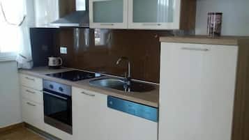 Apartment, Balcony, City View | Private kitchen