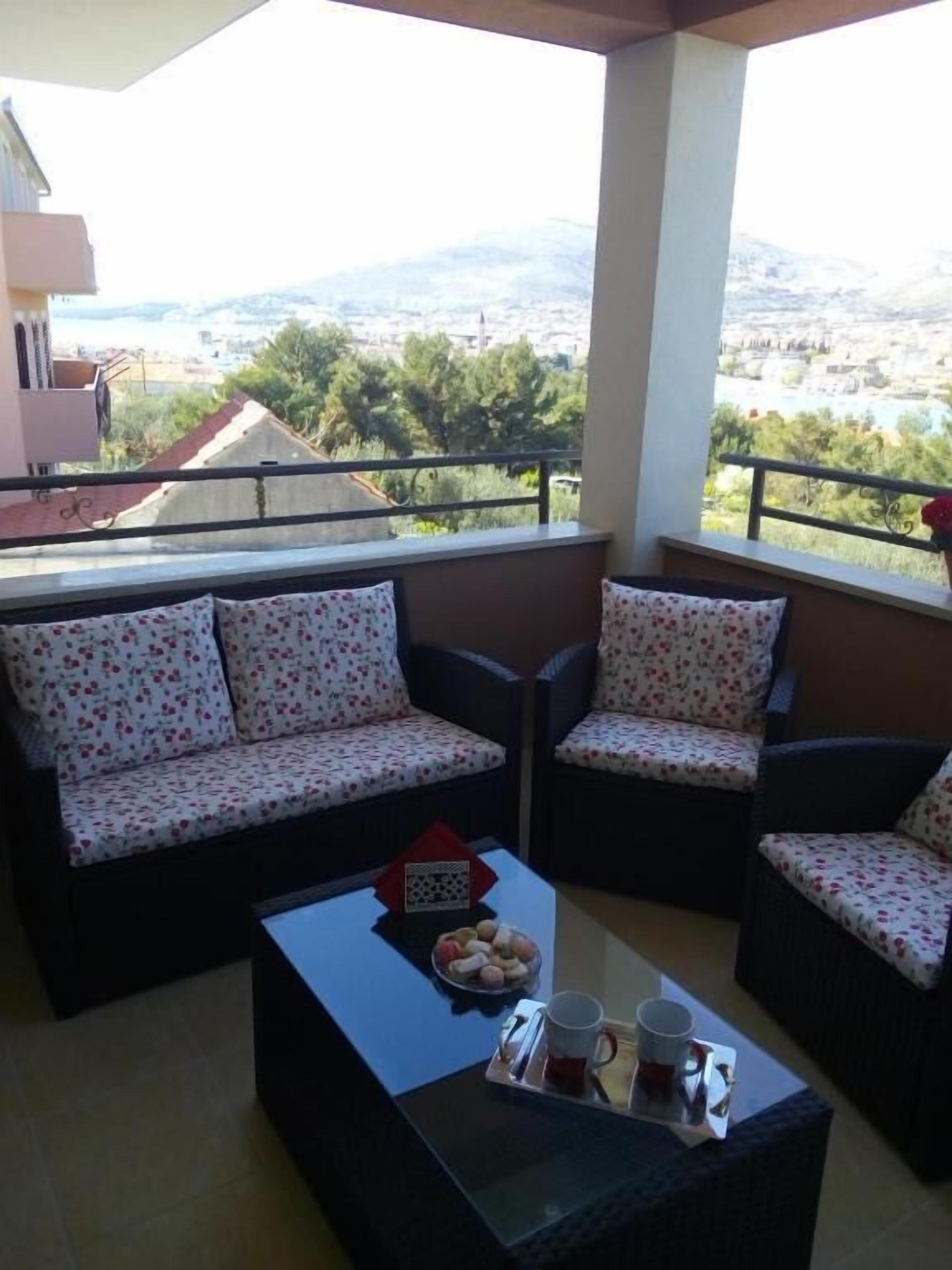 Apartamento, balcón, vistas a la ciudad | Jardines del alojamiento