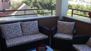 Apartamento, balcón, vistas a la ciudad | Jardines del alojamiento