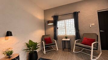 Premium bedding, pillow-top beds, desk, laptop workspace