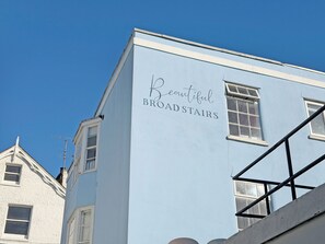 A building with a sign reading 'Beautiful BROAD STAIRS.'