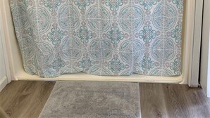 A shower curtain with a geometric pattern.