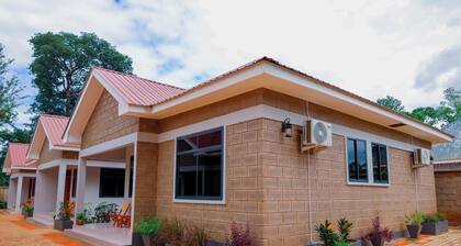 2-bedroom apartment in welcoming Moshi with AC for relaxing stays
