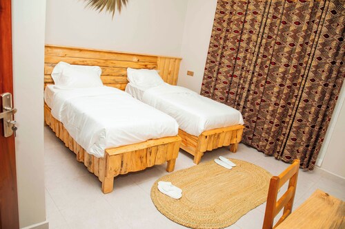 2-bedroom apartment in welcoming Moshi with AC for relaxing stays