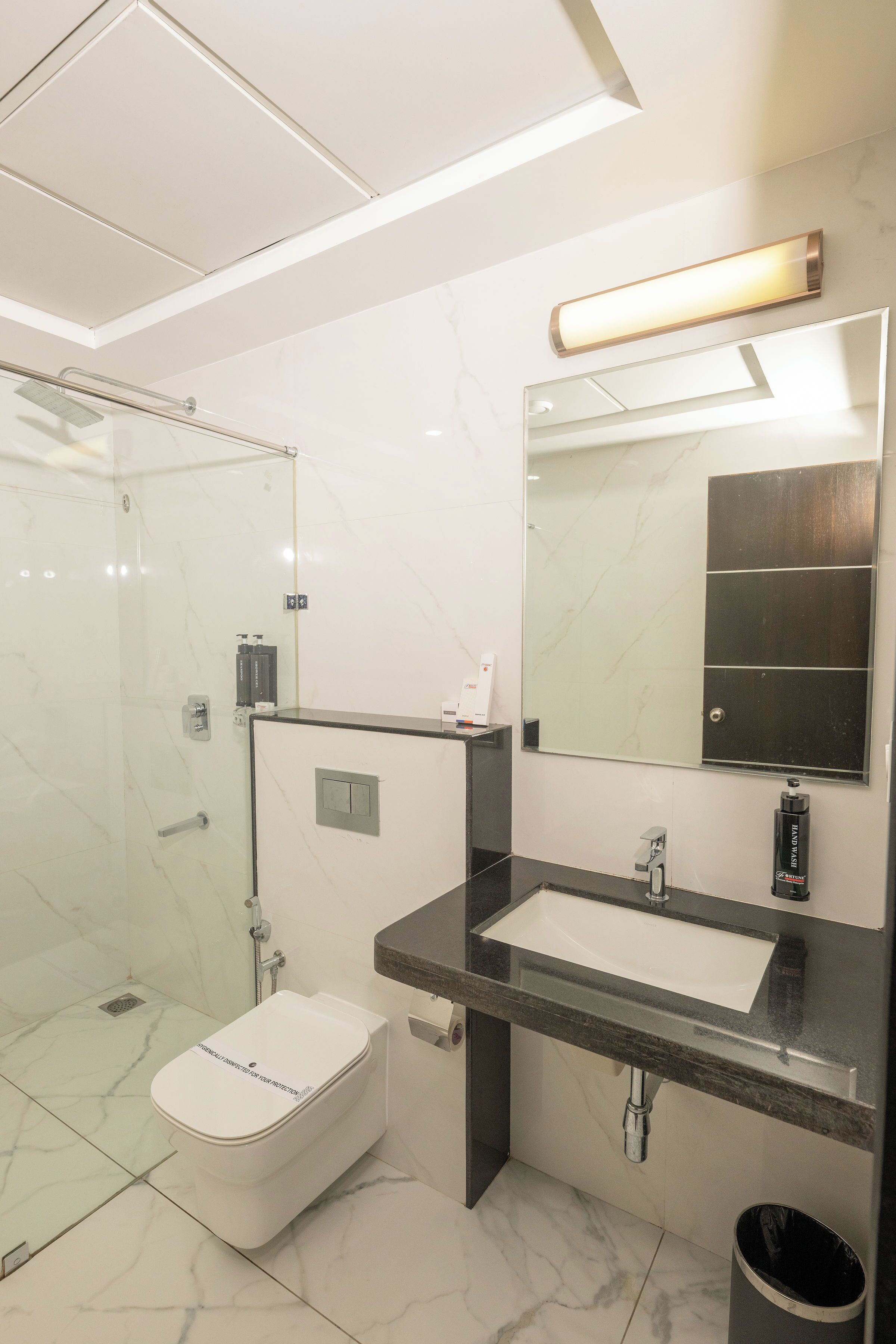 Shower, slippers, towels, soap