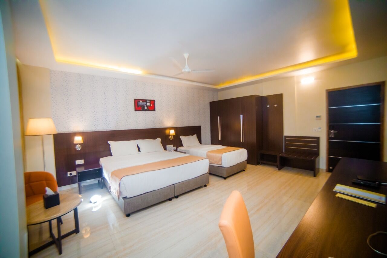 Triple Room with Balcony | In-room safe, blackout drapes, iron/ironing board, free WiFi
