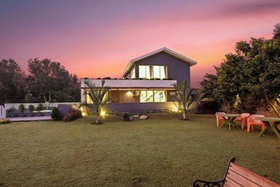 A beautiful & Green Farmhouse with a private Swimming pool & Garden .