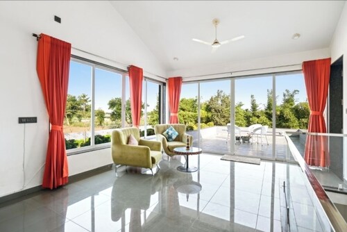 A beautiful & Green Farmhouse with a private Swimming pool & Garden .