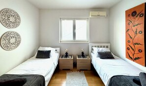 2 quartos, ferros/tábuas de passar roupa, Wi-Fi de cortesia