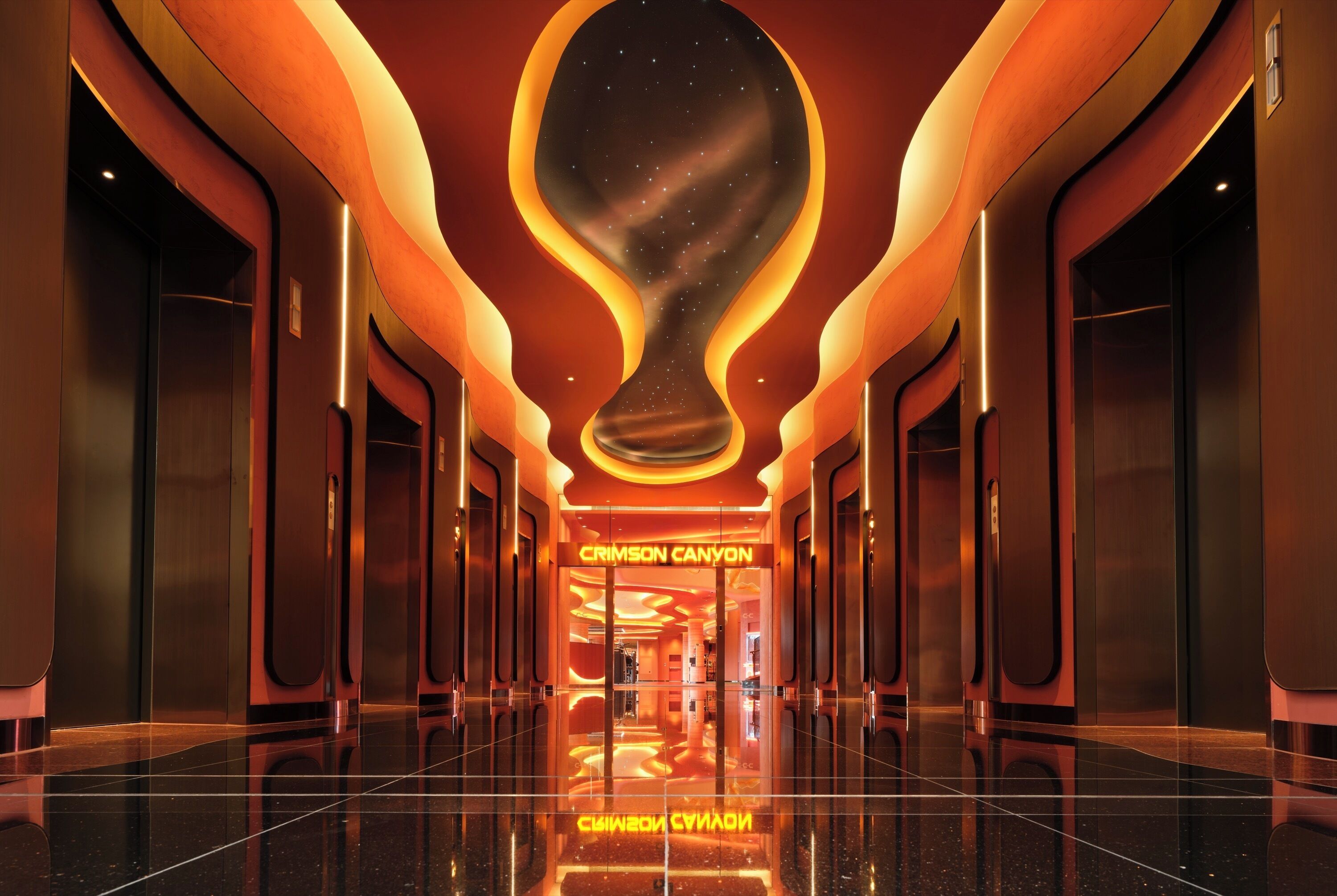 A modern hotel corridor with a unique ceiling design, a neon sign for 'CRIMSON CANYON,' and a reflective floor.