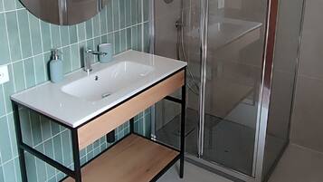 Shower, bidet, towels, soap