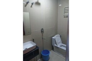 Quarto casal luxo de uso individual | Banheiro