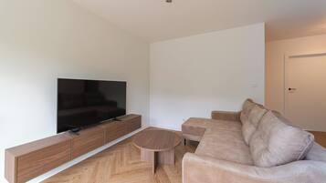 Deluxe-Apartment, Gartenblick | Wohnbereich