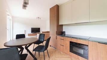 Appartamento Deluxe, vista giardino | Cucina privata | Seggiolone