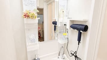 Hair dryer, bidet, towels, soap