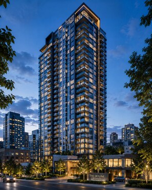 A high-rise residential building with multiple balconies, a well-lit entrance, and a clear view of the surrounding urban area. - The Robertson by Bukit Bintang (Kuala Lumpur)
