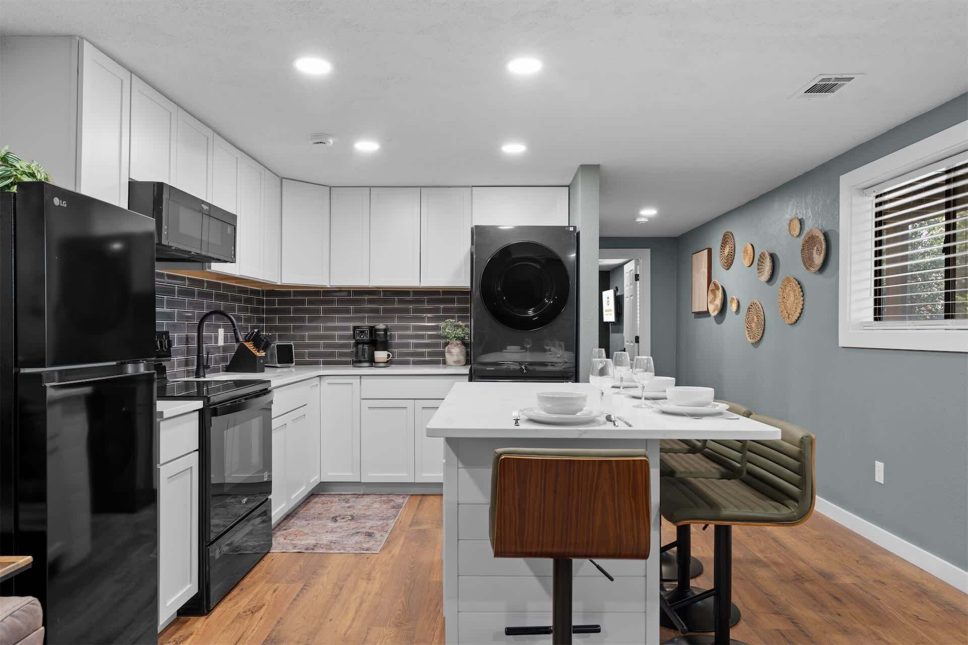 Fridge, microwave, stovetop, coffee/tea maker