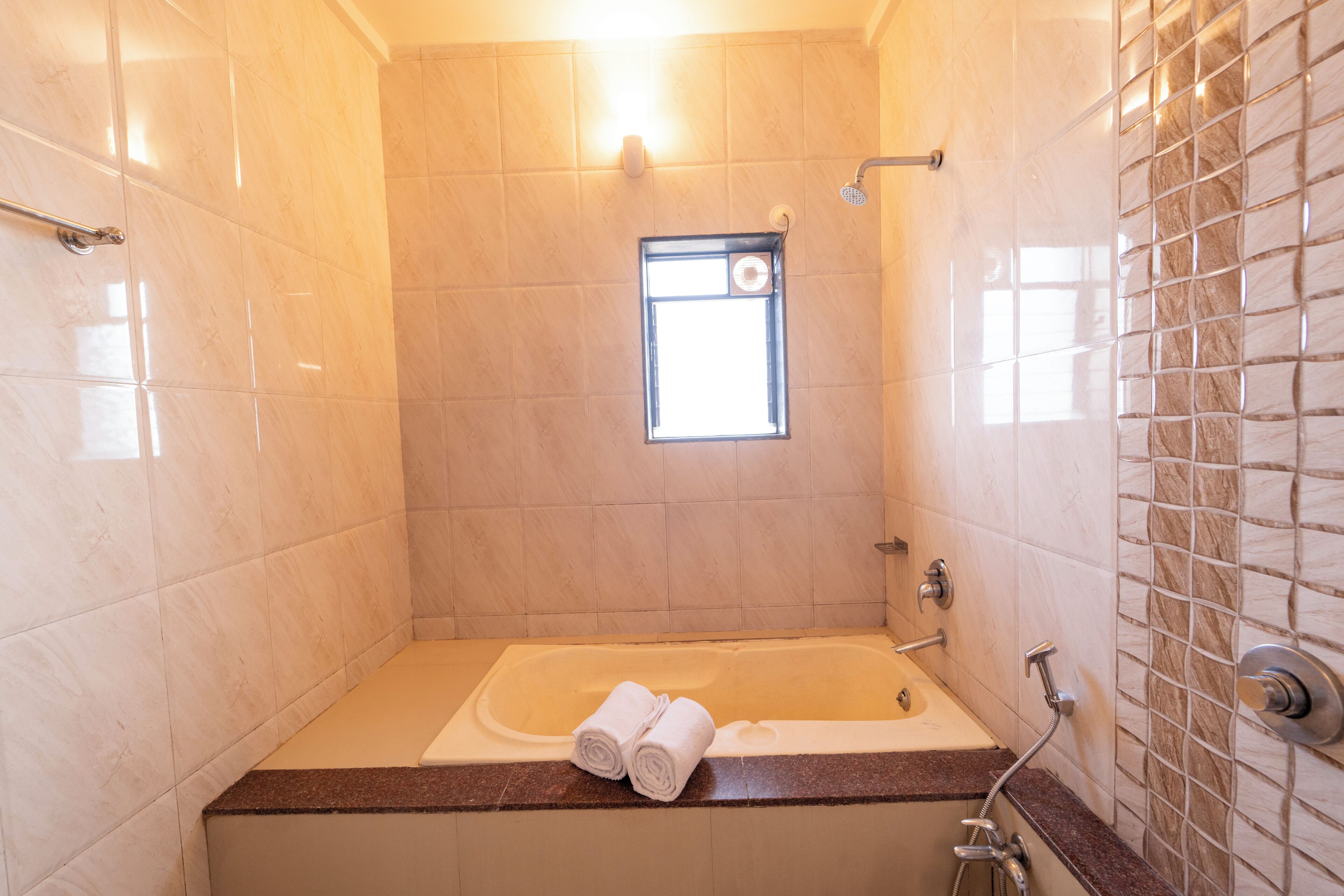 Shower, towels, soap, toilet paper