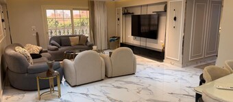 Spacious 3-bedroom apartment in tranquil Giza Governorate with AC