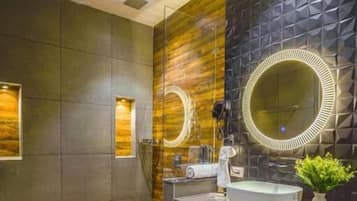 Shower, hair dryer, slippers, towels