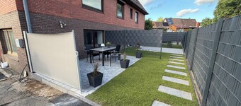 Vacation apartment with garden, terrace & top location between the old town and the sea