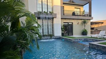 Outdoor pool, sun loungers