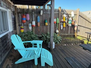 Unclassified image, 5 of 22, button - Wake up, grab your coffee, and walk barefoot to the beach. (Truro)
