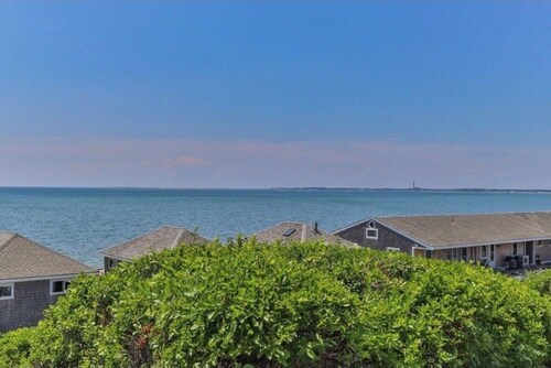 Wake up, grab your coffee, and walk barefoot to the beach.